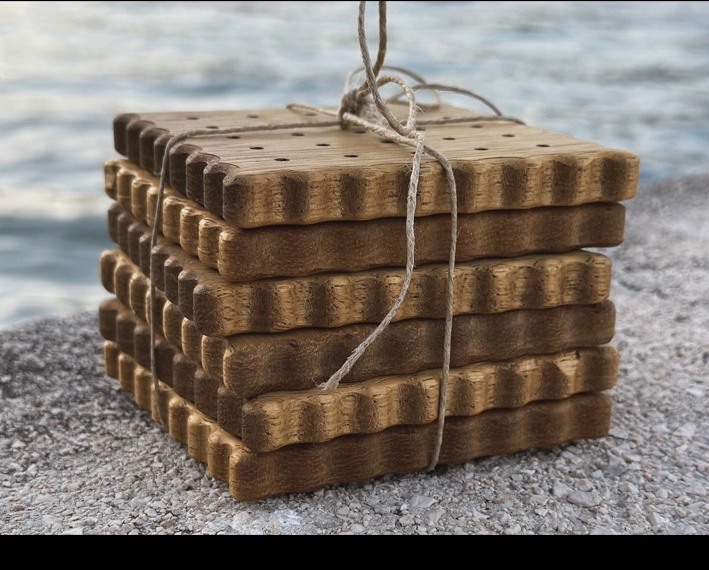 Finished CNC-cut wooden coasters