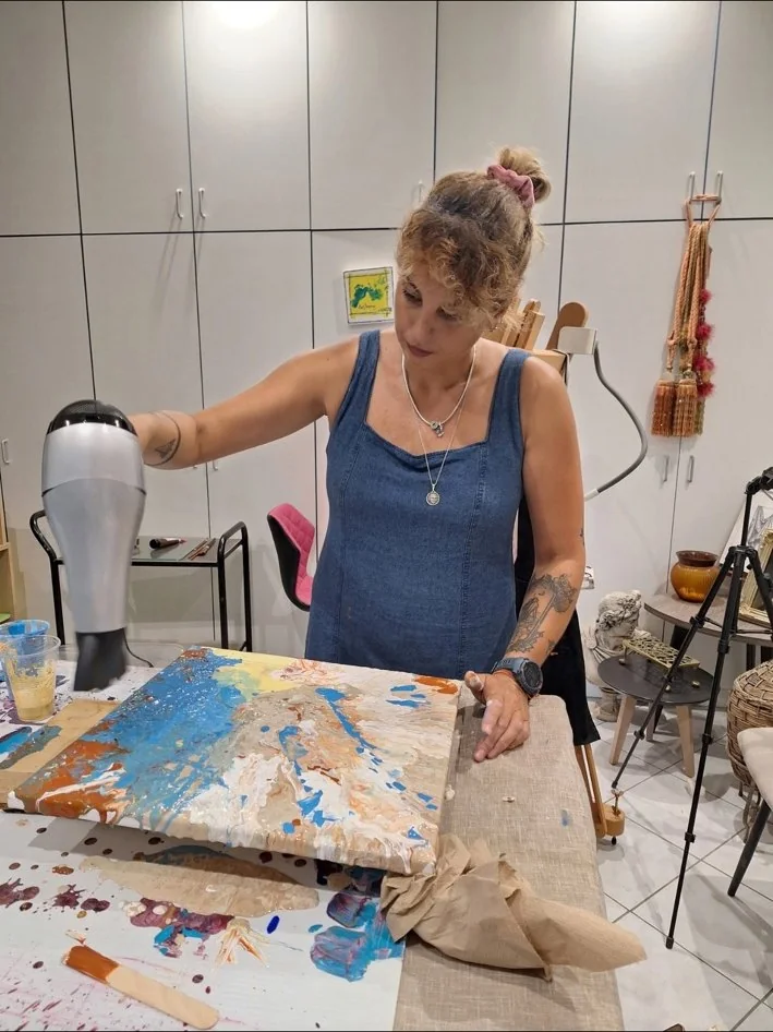Eleni Simatou working on an original artwork in her studio
