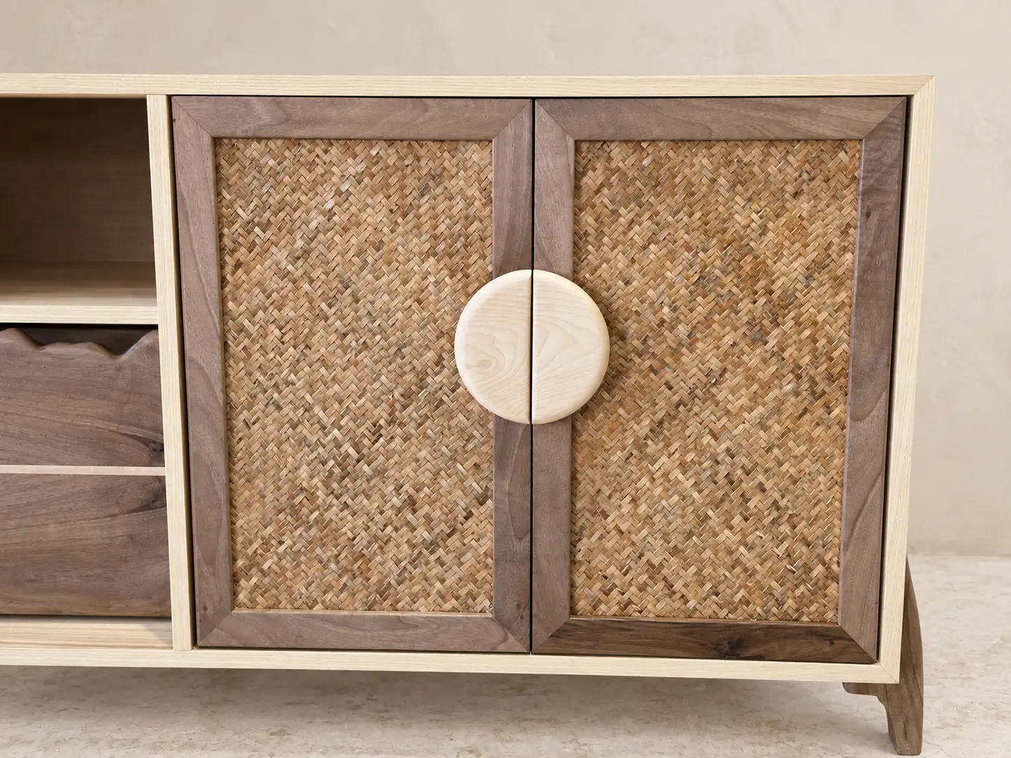 Woven door fronts and maple handles detail