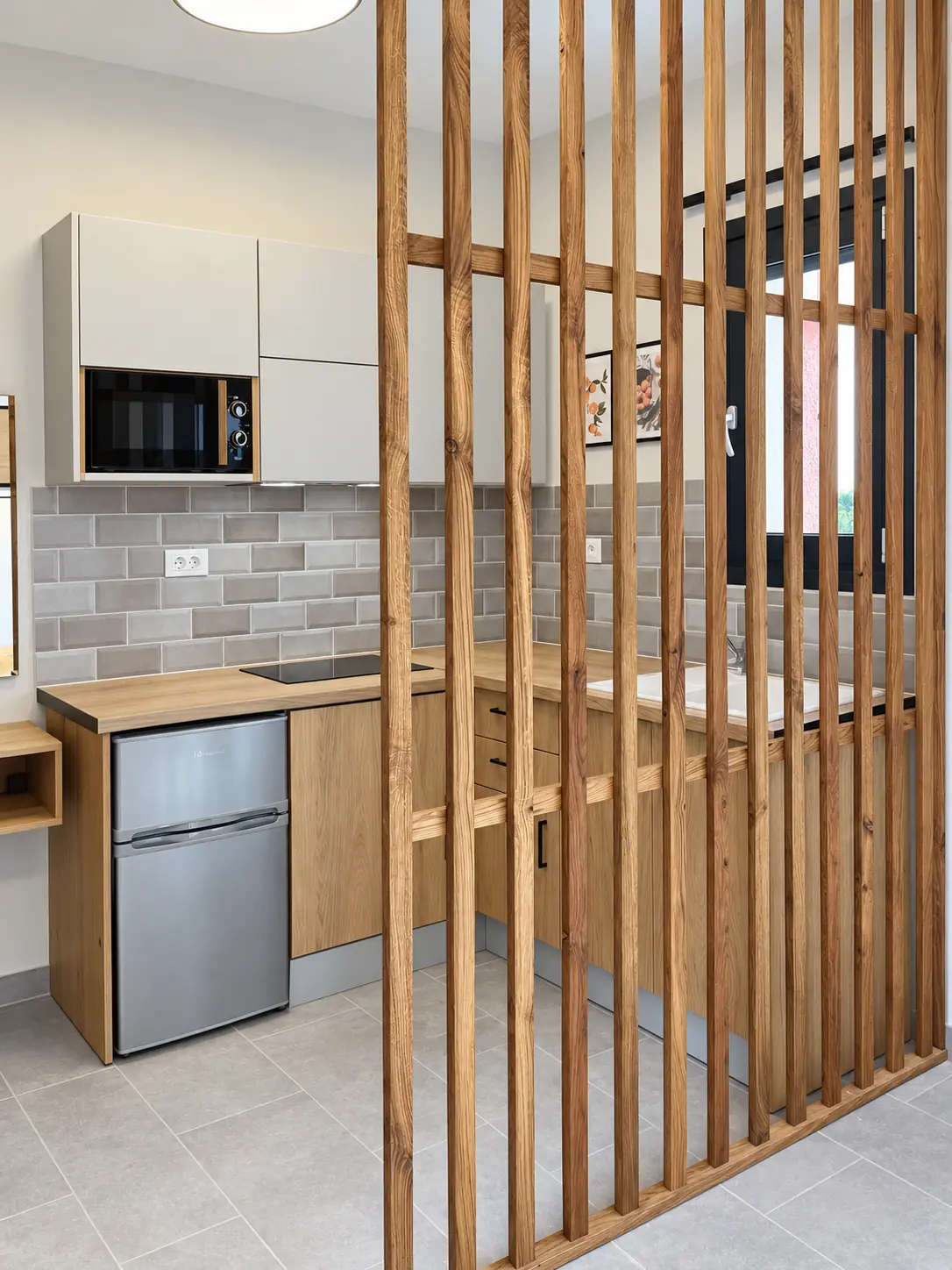Timber slatted divider separating the kitchen and sleeping area