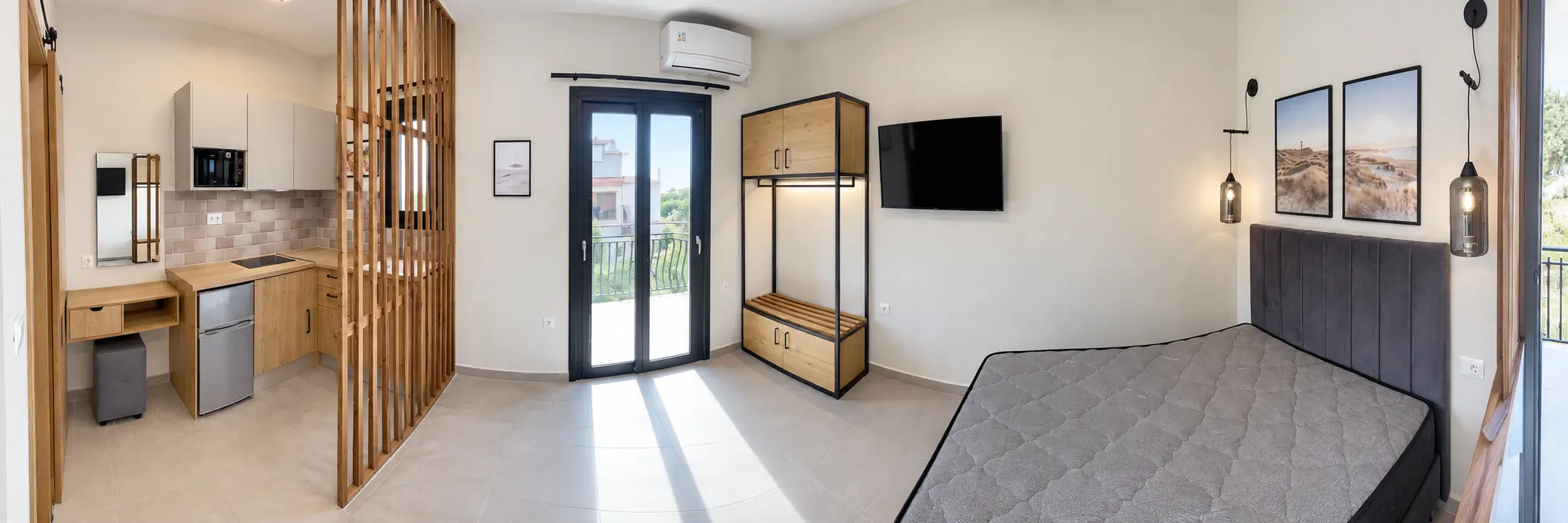 Panoramic view of the compact Moulinos Airbnb studio