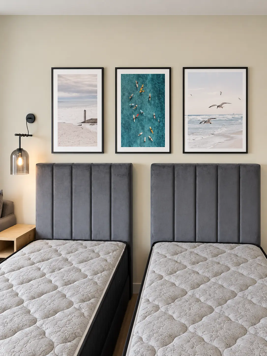 Twin bedroom with custom grey upholstered headboards